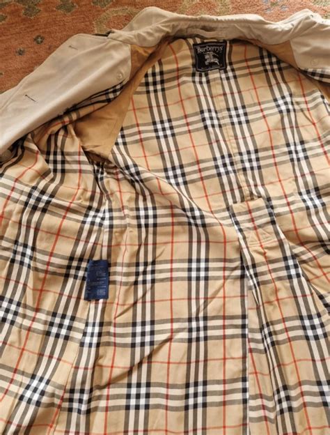 is on every burberry button written burberry|authenticity of burberry coat.